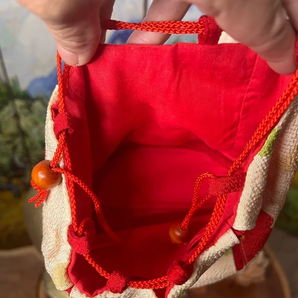 Adorable, Asian inspired, cream and red, wristlet, cinched, pouch purse.